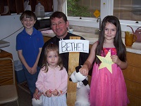 Rev. William Baker helping with the Children's Sunday School class